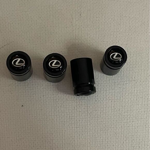 Lexus valve Stem caps in Black with logo set of 4 NWT - Picture 1 of 5